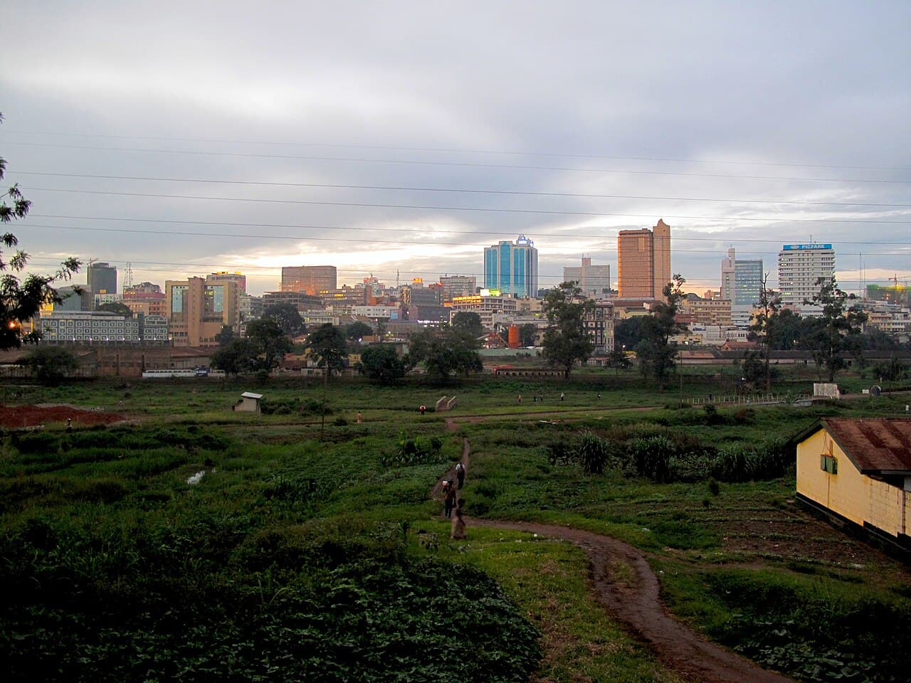 The Kampala skyline, the hub for assignments across the Central region.